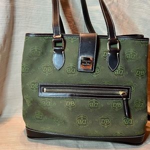 Dooney & Bourke shoulder bag. Like new! Canvas DB logo . Footed bottom